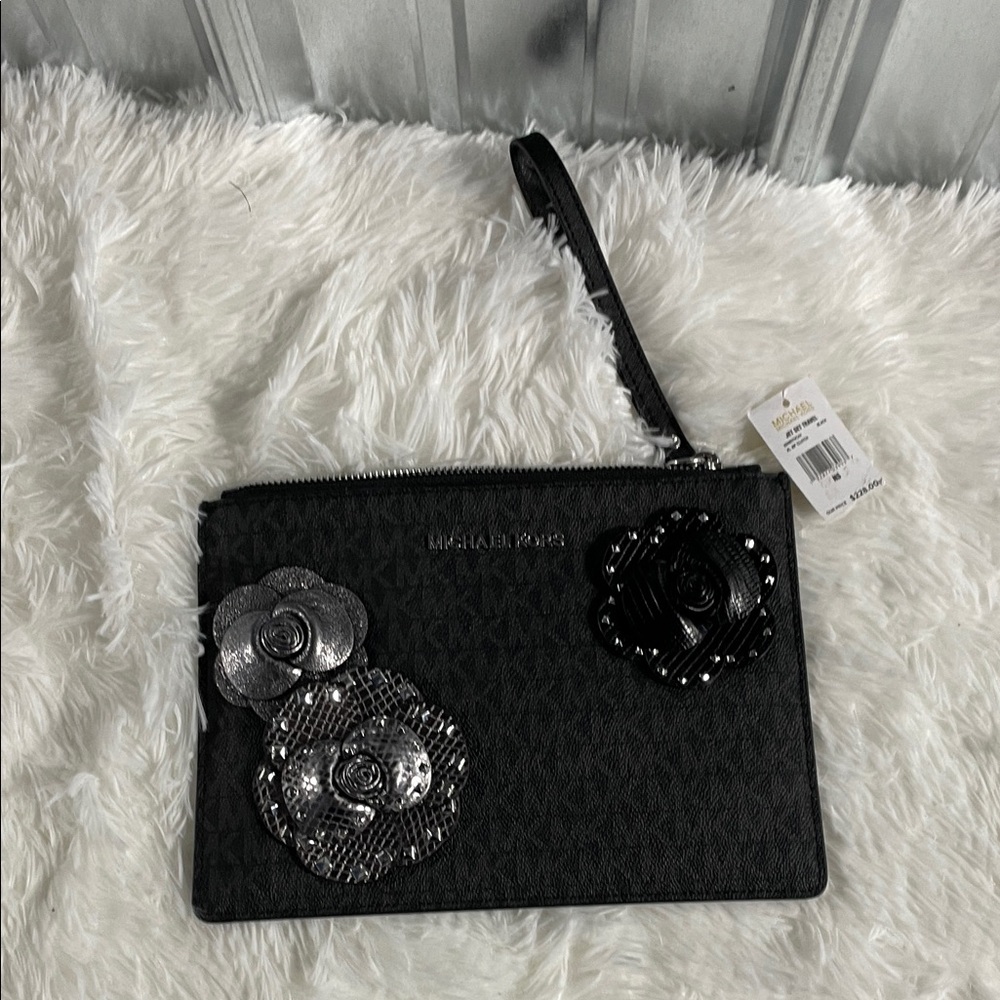 Michael Kors Black Wristlet with Metallic Floral Design